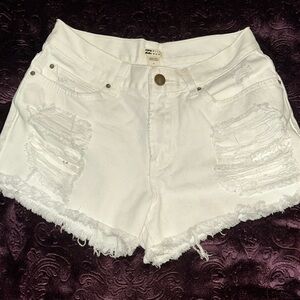 White Billabong Ripped Jean Shorts 
Sized: 25
Ripped 
Summer wear